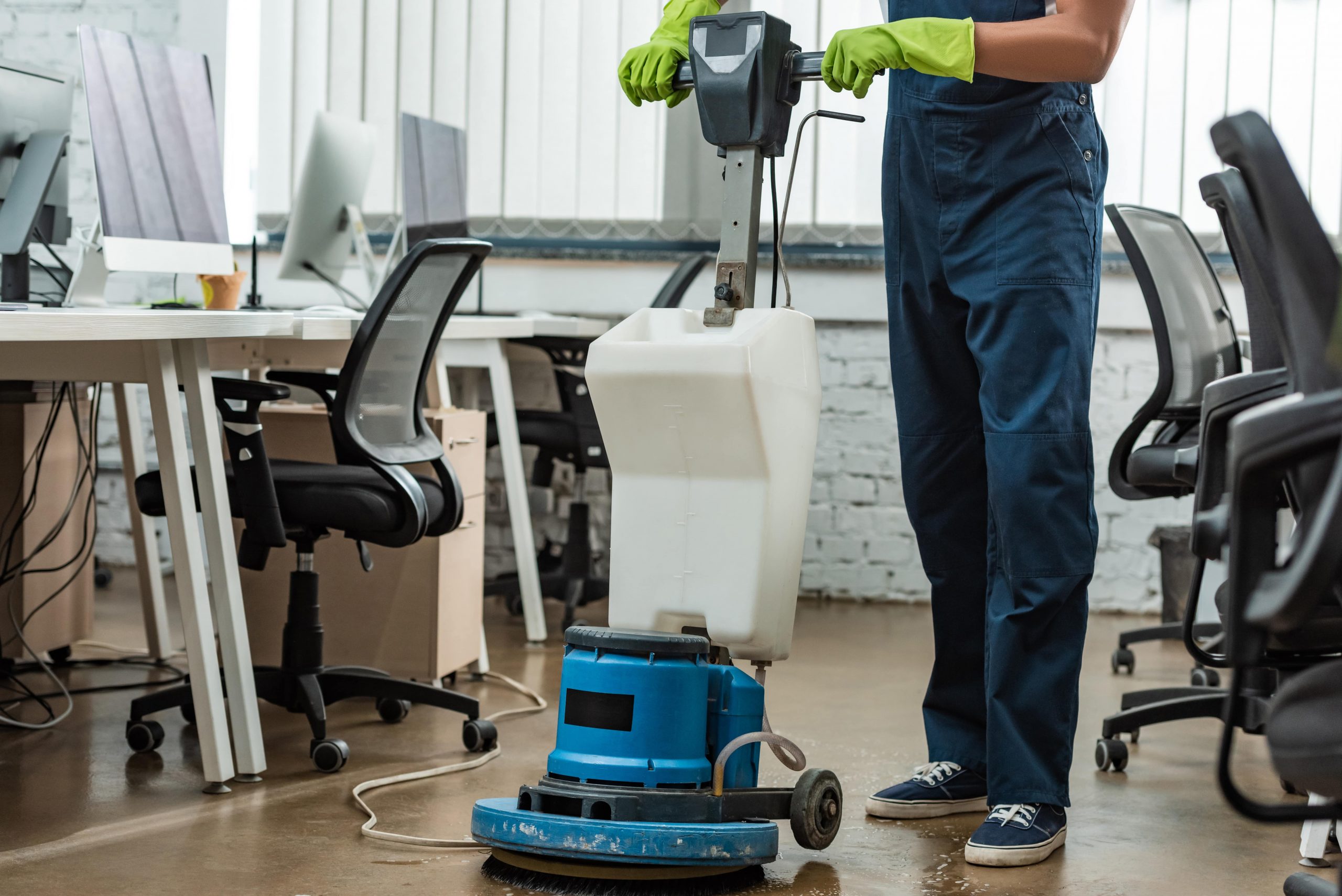 cropped-view-of-cleaner-washing-floor-in-office-wi-2022-12-16-15-26-40-utc-min